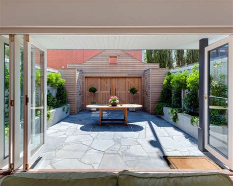 Cheap Patio Flooring Ideas | Houzz The patio floor made of wooden pallets is a cheap option that can give your yard an additional dimension.