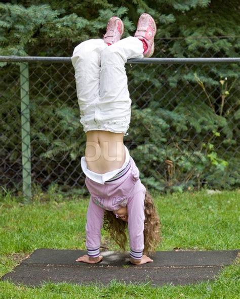 girl hanging upside down