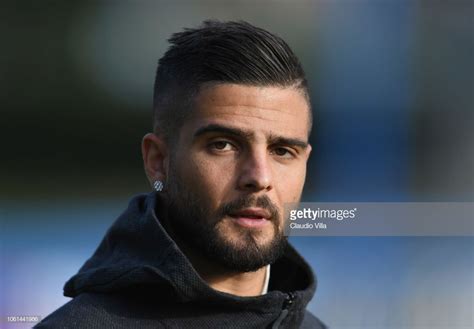 See more of lorenzo insigne on facebook. Lorenzo Insigne of Italy looks on before training session at Centro... | Lorenzo insigne, Insignes