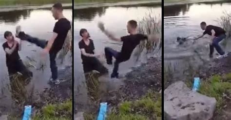 two drunk guys trying really hard to fight each other by in a lake facepalm video ebaum s world