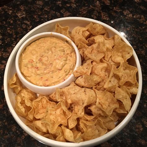 Pour 8 ounce of picante sauce. Healthy (not really) Cheese Dip (Chilli con queso) - madoli