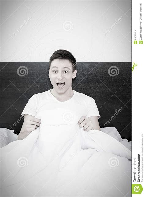 happy man smiling after masturbation in bed at home stock image image 53090511