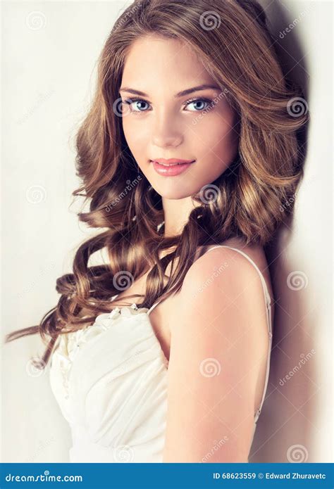 Smiling Beautiful Girl Brown Hair With An Elegant Hairstyle Hair