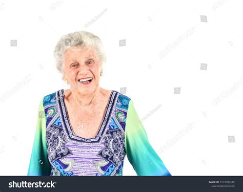 Beautiful Old Woman Laughing Against White Stock Photo 1163500249