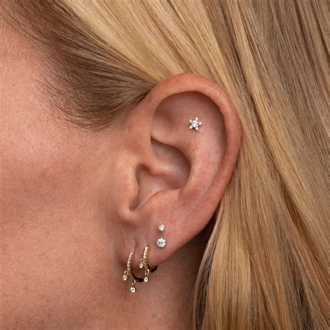 Golden Shared By E L I S ɑ ♡ On We Heart It Earings Piercings Ear Jewelry Pretty Ear Piercings