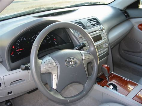 Dashboard icons are displayed in a variety of colors, depending on the system and its status in a specific vehicle. 2010 Toyota Camry - Pictures - CarGurus