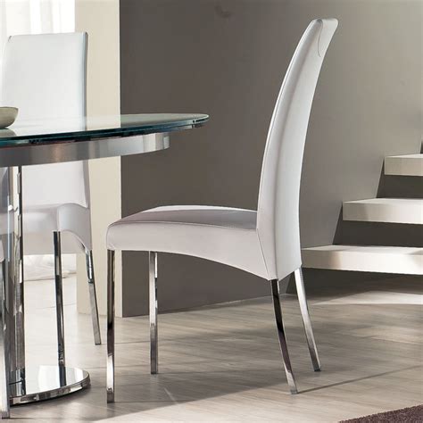 Take into account that the dining room should reflect your when it comes to buy dining room chairs, there is more to consider than the style and size of chairs. Luxury simplicity of modern white dining chairs | Dining ...