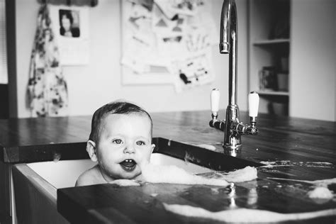 You can place a sling inside the bath. Barnaby's Kitchen Sink Baby Bath Photos // Kent Family ...
