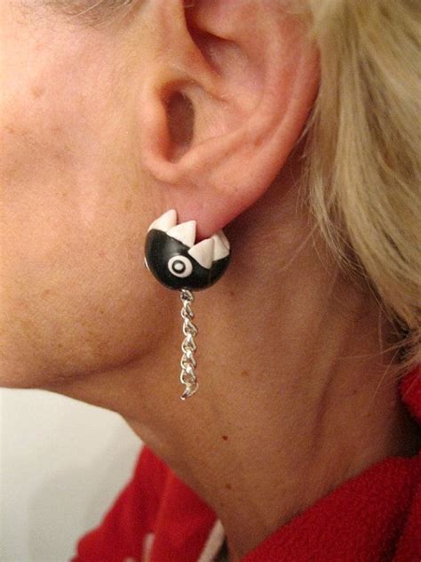 These Clever Earrings Let Chain Chomp Painlessly Nibble Your Earlobe