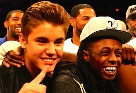 lil wayne and justin bieber manager squashes beef urban islandz