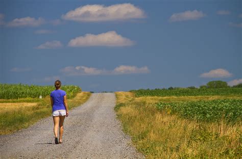 Country Dirt Roads Woman Walking Down A Rural Dirt Road In Flickr