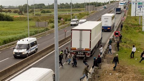 Migrant Stowaways Swarm Trucks In Tunnel Chaos