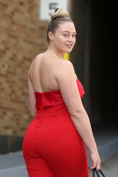 Iskra Lawrence Wearing A Red Jumpsuit Attends Badgley Mischka Spring