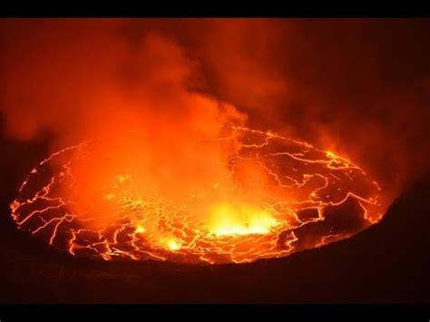 Overall orange alert volcanic eruption for nyiragongo. Nyiragongo volcano DRC Congo timelapse day into night ...