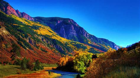 Beautiful Scenery Nature River Between Colorful Trees Slope Mountains