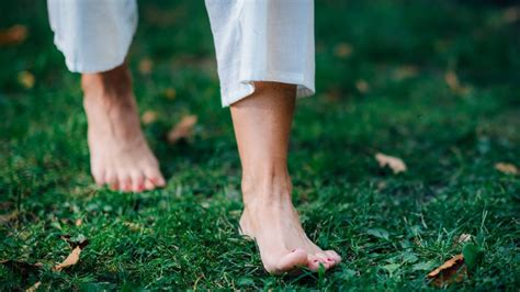 6 Health Benefits Of Walking Barefoot On The Grass Expert Explains
