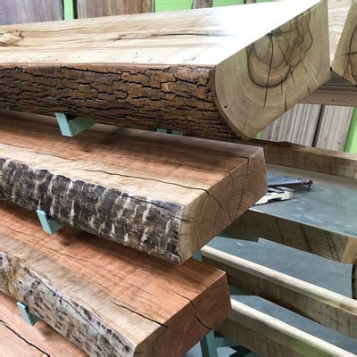 Our mantels are made from live edge redwood slabs. Live Edge Mantel l Fireplace Mantel