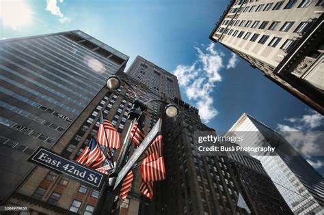 American Flags Decorating Street Light At East 42nd Street In Midtown