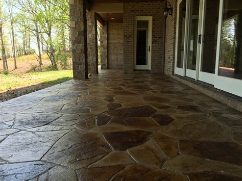 Concrete driveways are durable, strong, and maintenance is relatively easy. Stamped and stained concrete driveway, patio & sidewalk at ...