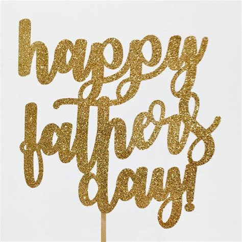 A Cake Topper That Says Happy Fathers Day On It With Gold Glitter