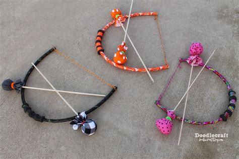 Make a diy bow and arrow! Doodlecraft: Hula Hoop Bows and Padded Arrows!