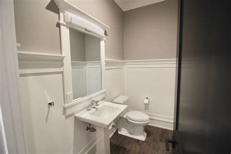 White Pedestal Sink And White Wainscoting Construction Builders New