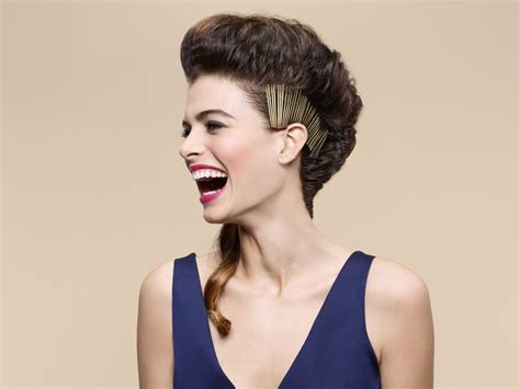 Mohawks and liberty spikes are two versions of a classic punk hairstyle. Curly hair braided into a Mohawk style with golden pins