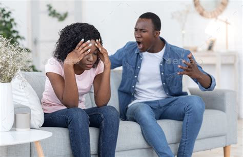 Angry Black Man Yelling At His Crying Wife Stock Photo By Prostock Studio
