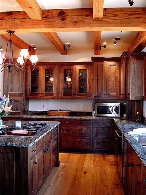 Our reclaimed wood consists of cupboards made of softwood, giving your living environment a captivating vintage style. Custom Walnut Kitchen | Rustic kitchen cabinets, Rustic ...
