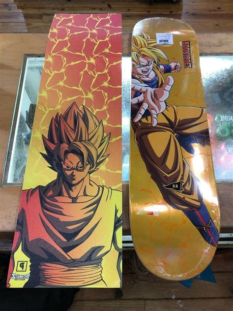 This black deluxe jersey from dragon ball z features golden embroidery and has goku's kanji on the front and the back. Primitive Dragon Ball Z Goku 8.0" Skateboard Deck