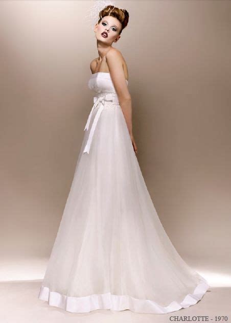Abiti da sposa con applique senza maniche cuore fancy naturale. Abiti da sposa anni 60 foto