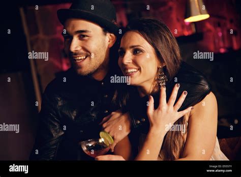 Cheerful Couple Together At The Club Enjoying The Nightlife Stock Photo