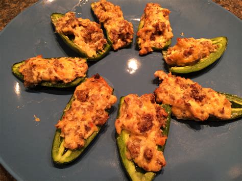 Spoon about 1 tablespoonful into each jalapeno half. Zesty Low-Carb Jalapeno Peppers Stuffed With Sausage and ...