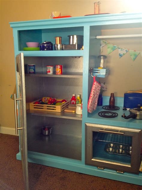 These amazing repurposed play kitchens made from entertainment centers, cabinet or tables are all over the internet, so it wasn't hard to figure out what i. Tending the Home Fires: DIY Repurposed Play Kitchen