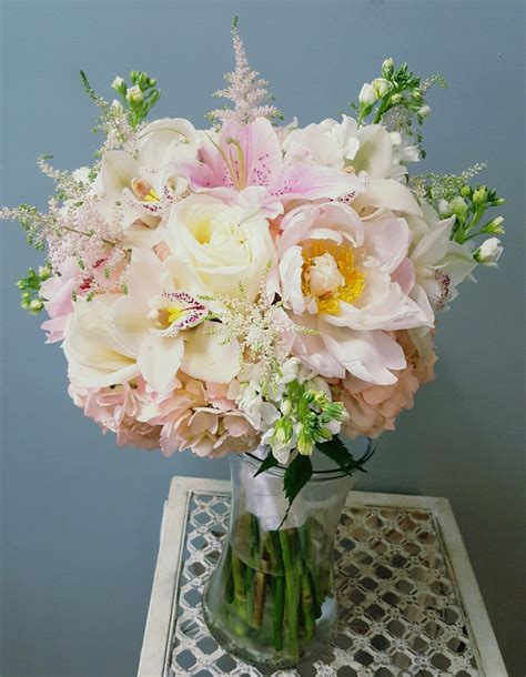 42 results | 42 results 42 results. Pink and white Bridal Bouquet: Peonies, Roses, Cymbidium ...