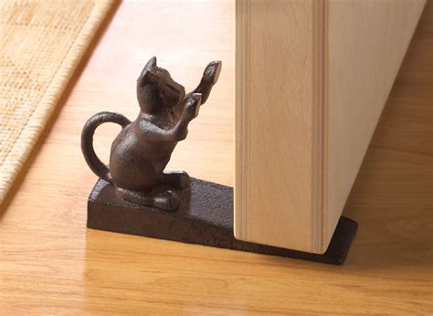 Tabby cat stretching on door frame. Wholesale Cat Scratching Door Stopper - Buy Wholesale Home ...