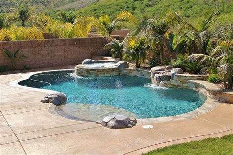 Freeform Pool Spa Combo With Rock Waterfall Backyard Pool Backyard