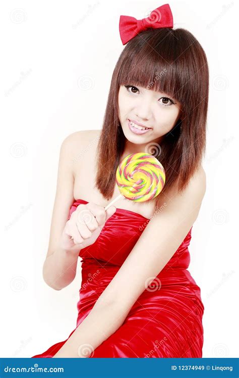 chinese girl with sweet candy stock image image of holiday asian 12374949