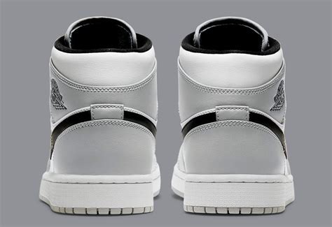 Underfoot, the midsole houses the usual air for cushioning. DIOR-INSPIRED "LIGHT SMOKE GREY" AIR JORDAN 1 MID DROPPING ...