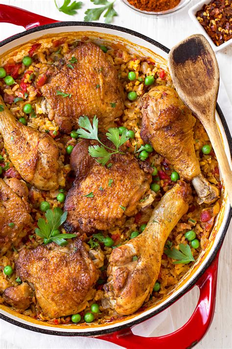 This mexican version of arroz con pollo includes large cubes of chicken and spicy green chilies. Arroz con Pollo | The Cozy Apron | Recipe in 2020 ...