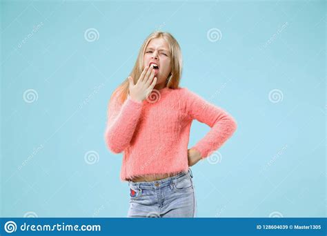 Beautiful Bored Teen Girl Bored On Blue Background Stock Image Image