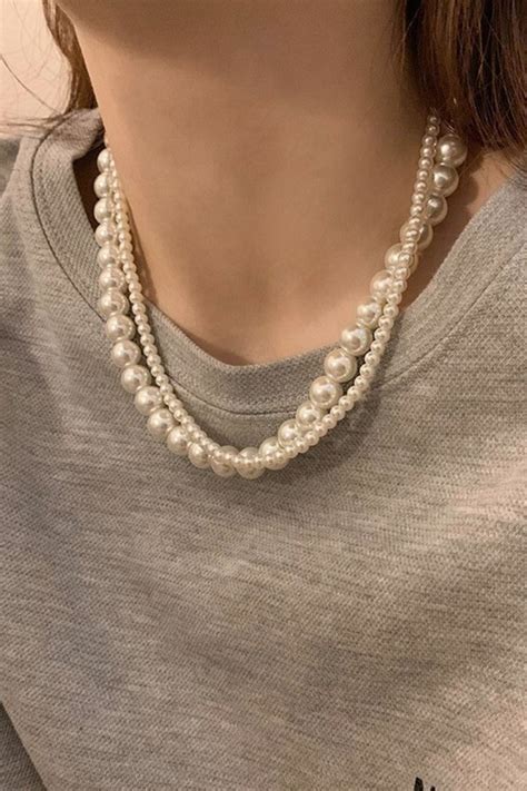A Pearl Necklace Can Add A Touch Of Elegance And Sophistication To