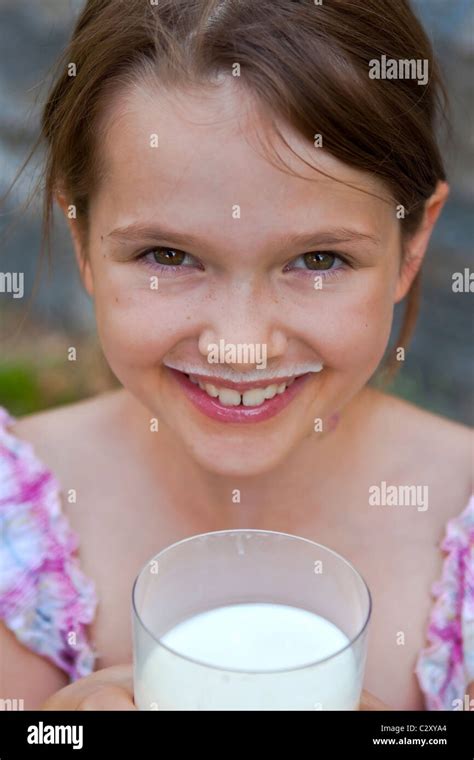 Girl Is Drinking Milk Stock Photo Alamy