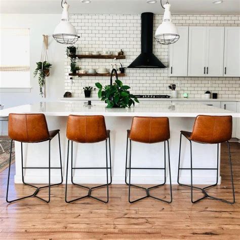 You may find bar stools with arms, backs, and swivel capabilities more comfortable than backless stools. Slope Leather Bar & Counter Stools | Stools for kitchen ...
