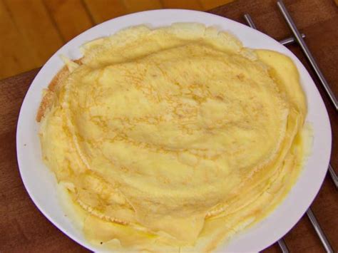 These homemade crepes are made with only 6 ingredients, and have the classic eggy flavor you'd expect from these thin and delicious pancakes. Crepes Recipe | Bobby Flay | Food Network