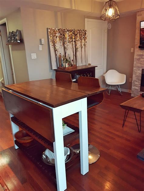 A kitchen island is a useful and multifunctional component. DIY Drop Leaf Kitchen Island / Cart - Bachelor on a Budget