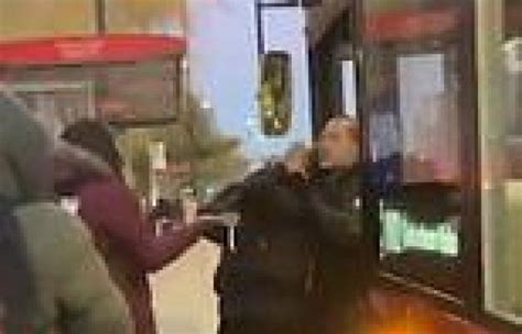 moment male bus driver fights with woman who he claims attacked him