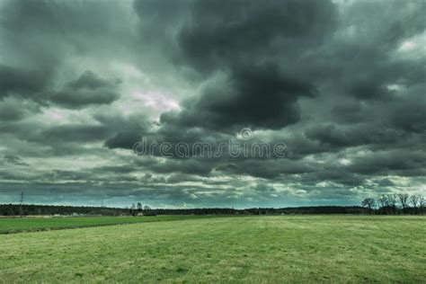 Dark Clouds Over Vast Fields Stock Photo Image Of Vast Horizon