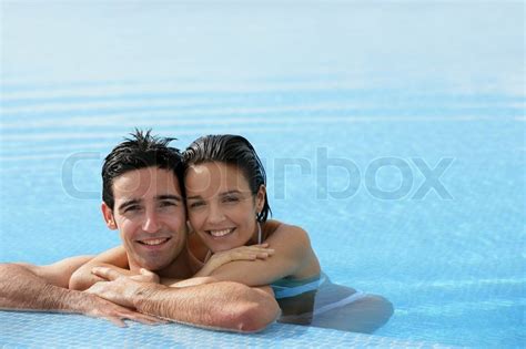 Affectionate Couple In Swimming Pool Stock Image Colourbox