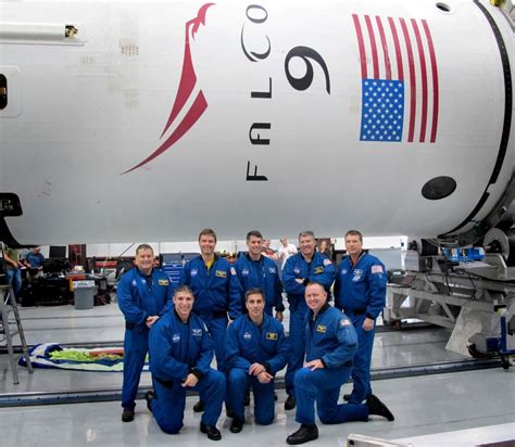 Great Photo Of Nasa Astronauts With Falcon 9 Helping Prepare Cargo For
